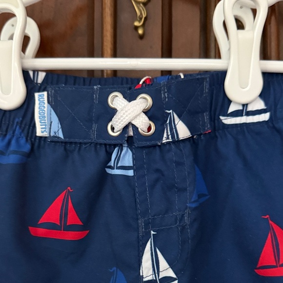 RUGGED BUTTS Nautical Swim Trunks - Blue with Red and White Sailboats 12-18M NWT - Picture 3 of 5